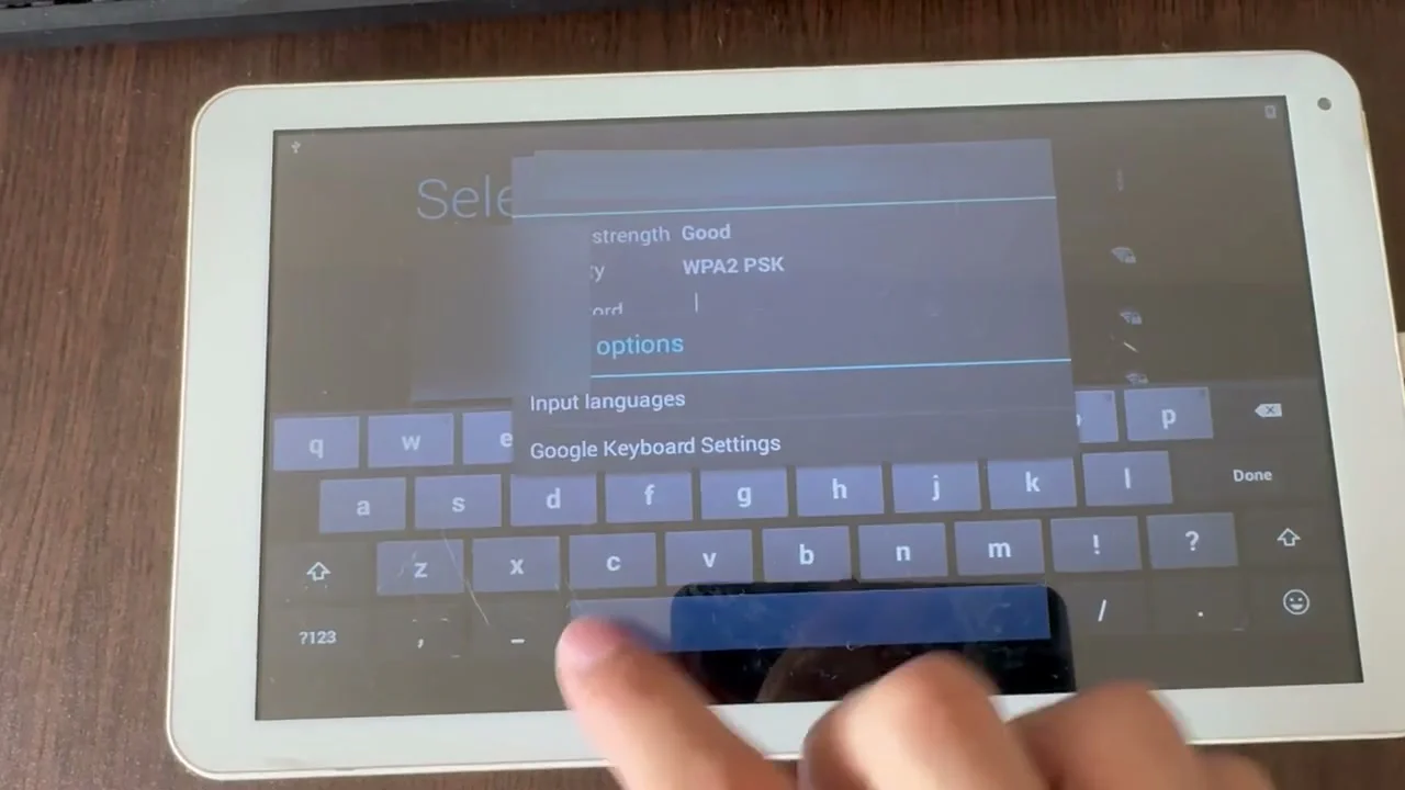 The TrekStor tablet navigating from the Wi-Fi setup screen into the full Settings app